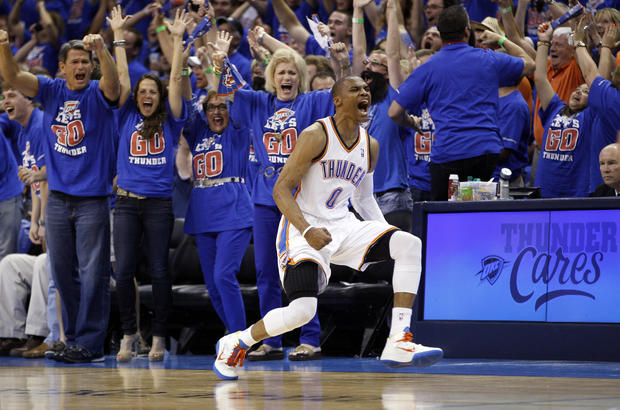 Russell Westbrook reacts after hitting a basket 