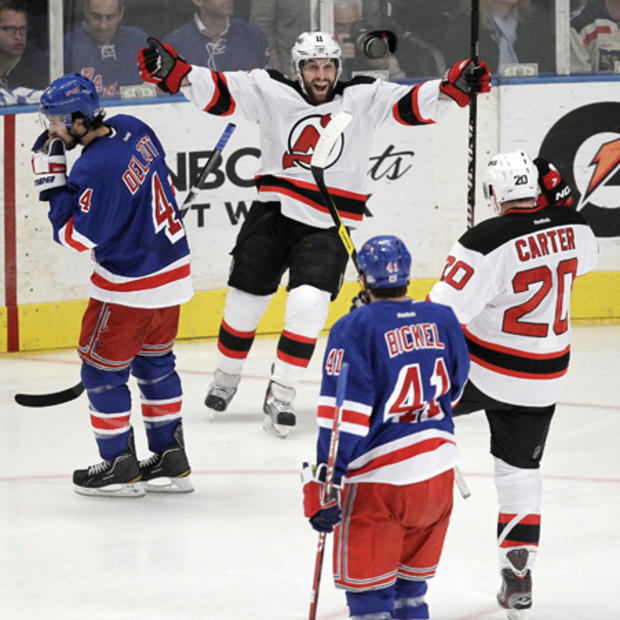 Stephen Gionta celebrates with Ryan Carter after scoring a goal  