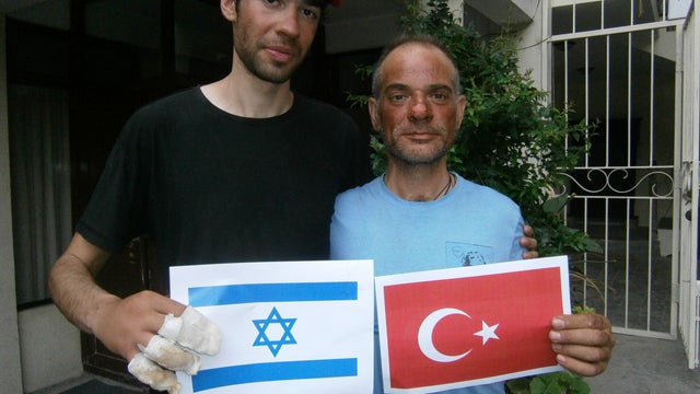 Unidentified mountaineers descend from the summit of Mount Everest May 19, 2009. 
