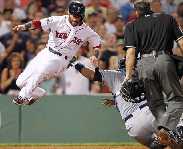 Jose Molina tags Dustin Pedroia 