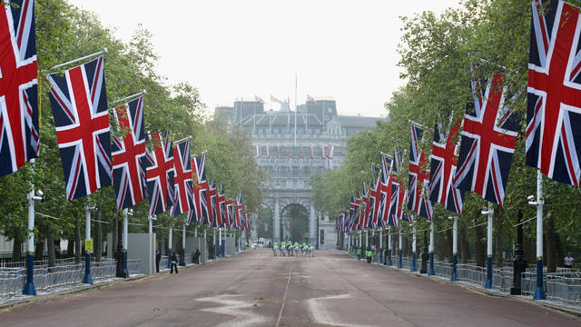 Police horses on The Mall bedecked with Union Flags following a dress rehearsal 