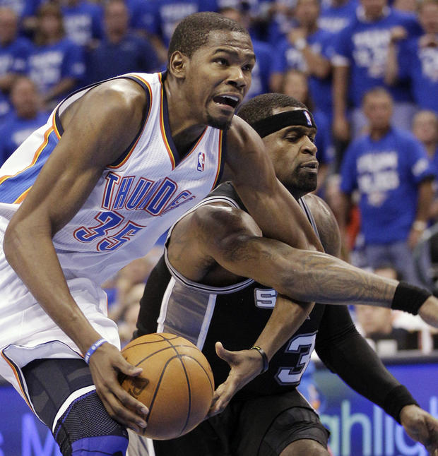 Kevin Durant is wrapped up Stephen Jackson 