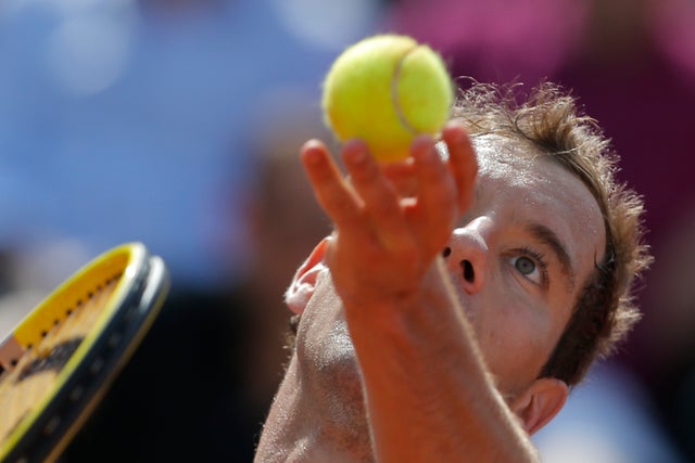 Richard Gasquet serves in his third round 