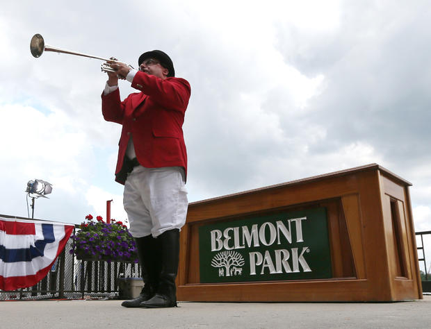 Sam "Sam the Bugler" Grossman announces the fourth horse race at Belmont Park  