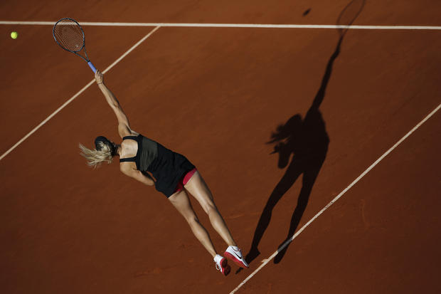 Maria Sharapova serves in her semi final match  