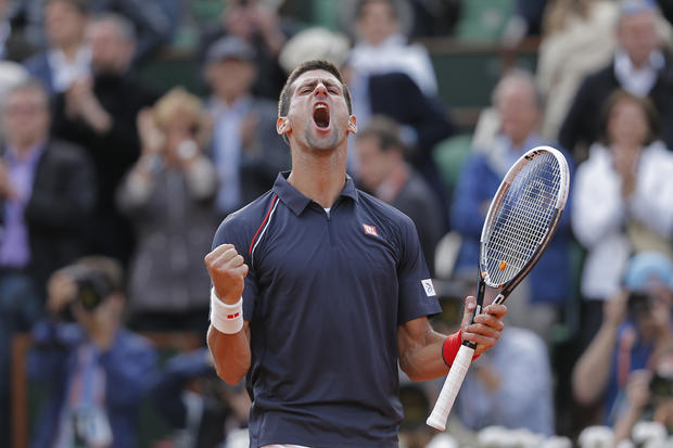 Novak Djokovic of Serbia celebrates 