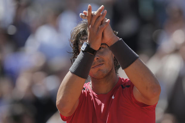 Rafael Nadal celebrates winning his semi final match against compatriot David Ferrer 