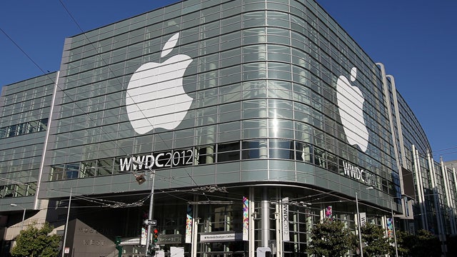 Attendees line up to enter the Apple World Wide Developers Conference (WWDC) at Moscone West on June 11, 2012 in San Francisco, Calif. 