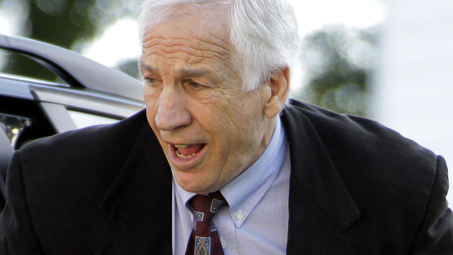 Former Penn State University assistant football coach Jerry Sandusky arrives for the third day of his trial at the Centre County Courthouse in Bellefonte, Pa., June 13, 2012. 