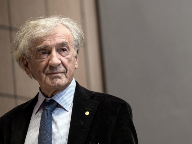 Elie Wiesel, Holocaust survivor and founding chairman of the United States Holocaust Memorial Council, leaves after introducing President Obama at the United States Holocaust Memorial Museum April 23, 2012, in Washington, D.C. 