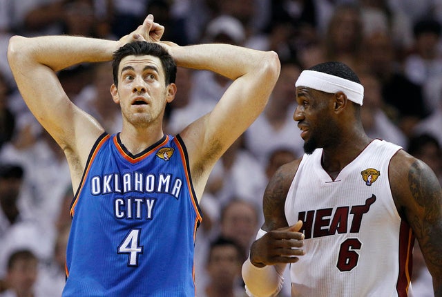 Nick Collison and LeBron James react 