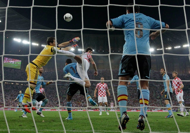Iker Casillas makes a save 