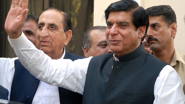 Pakistan's premier-designate Raja Pervaiz Ashraf waves to his supporters in Islamabad, Pakistan, on Friday, June 22, 2012.  
