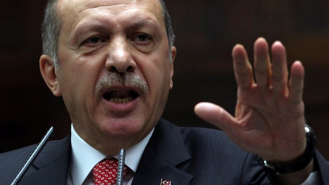 Turkish Prime Minister Recep Tayyip Erdogan addresses members of his Justice and Development Party at the parliament in Ankara, Turkey, June 26, 2012. 