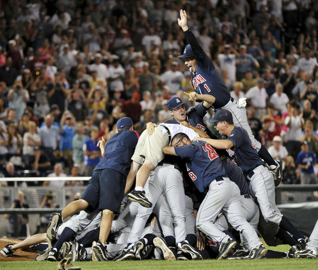 Arizona players pile up following their 4-1 victory 