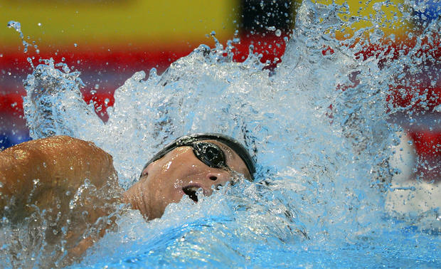 Jason Lezak swims in the men's 100-meter freestyle 