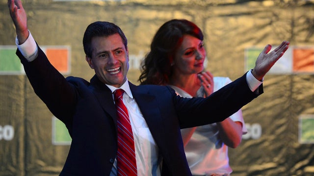 Enrique Pena Nieto, accompanied by his wife Angelica Rivera 