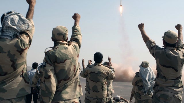 Iranian Navy boats take part in maneuvers during navy exercises in the Strait of Hormuz 