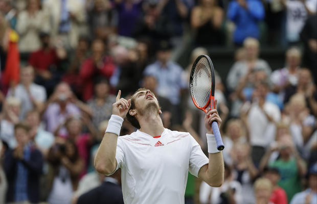 Andy Murray of Britain reacts after defeating David Ferrer 