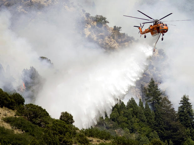 Air crews continue to battle a wildfire near Alpine, Utah, July 4, 2012. 