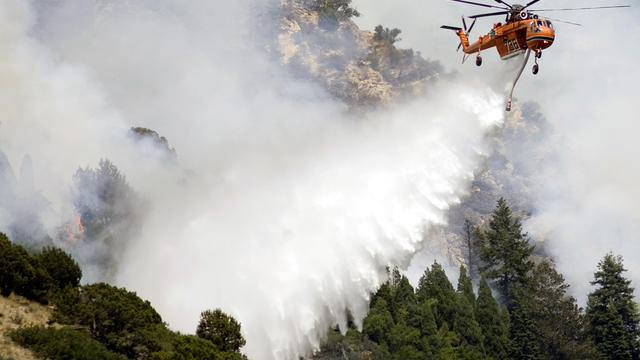 Air crews continue to battle a wildfire near Alpine, Utah, July 4, 2012. 