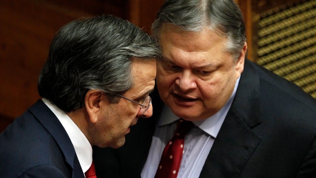Greek Prime Minister Antonis Samaras and Socialist leader Evangelos Venizelos  