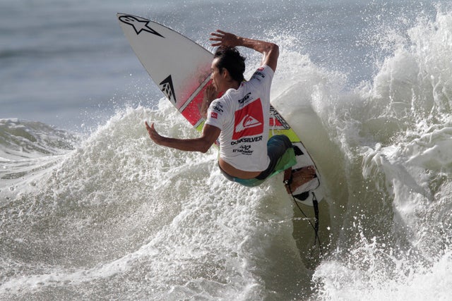 Surfer Gavin Gillete competes during the Quiksilver Cup 