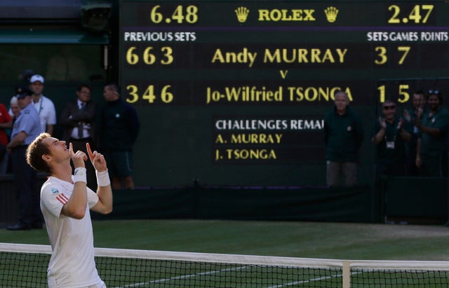 Andy Murray reacts after defeating Jo-Wilfried Tsonga  