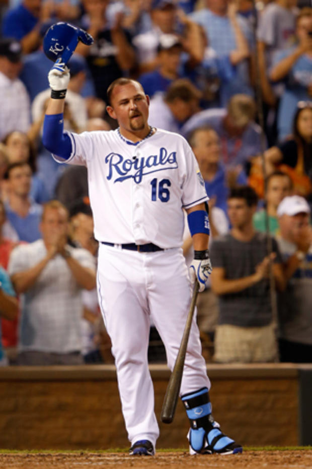 Billy Butler waves to the crowd before his at bat  