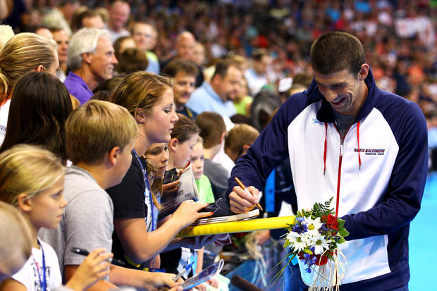 Michael Phelps signs autographs for fans 