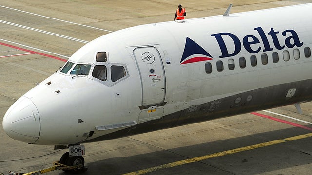 A Delta Air Lines jet is pushed back from the terminal before departing Hartsfield-Jackson Atlanta International Airport in Atlanta Sept. 12, 2009. 