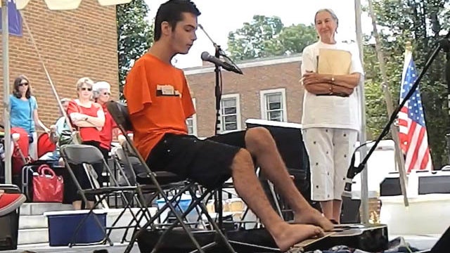 George Dennehy, armless guitar player 