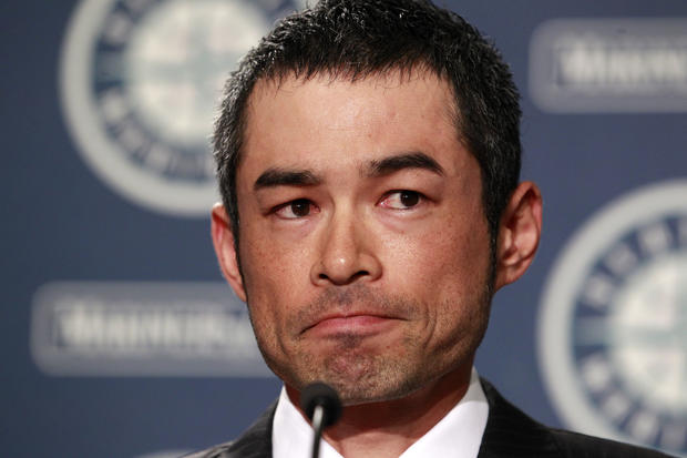Ichiro Suzuki pauses before answering a question at a news conference 