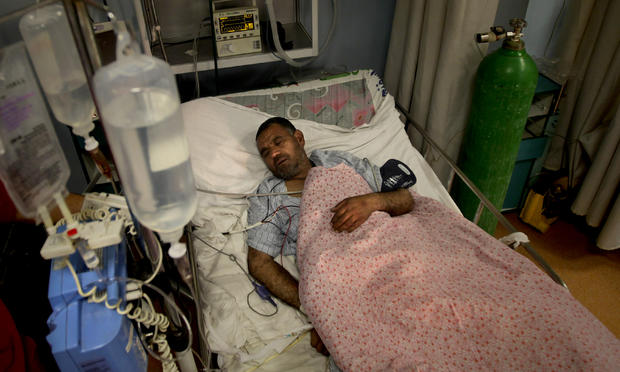 In this photo taken on Dec. 19, 2010, A wounded Afghan soldier recuperates at Dawood National Military Hospital in Kabul, Afghanistan. 