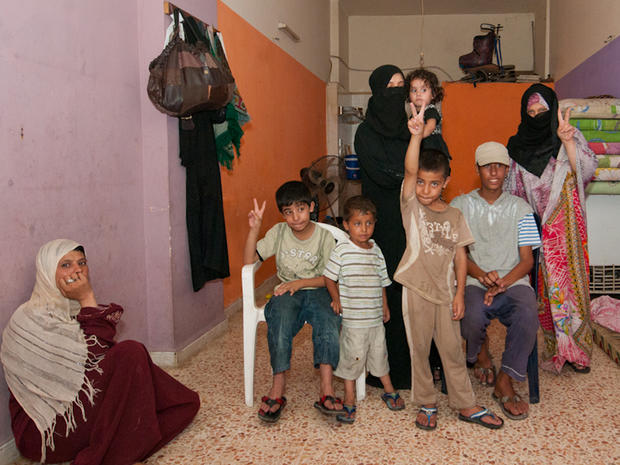 Syrian refugee Um-Khaled with her family 
