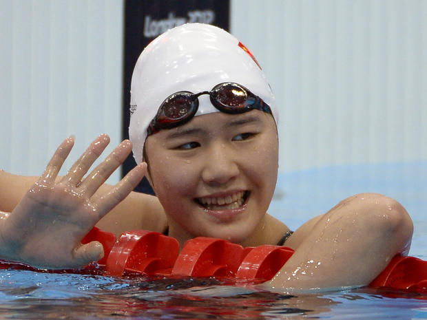 China's Ye Shiwen gestures after competing in women's 200-meter individual medley swimming semifinal at Aquatics Centre in Olympic Park Monday 