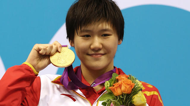 Ye Shiwen shows off her gold, won in the Women's 400m Individual Medley 