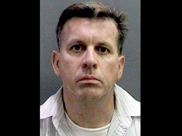 Rainer Reinscheid, 48, a professor at the University of California, Irvine, is pictured in a booking photo. 
