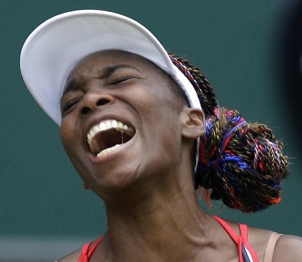 Venus Williams of the United States screams during her match against Aleksandra Wozniak  