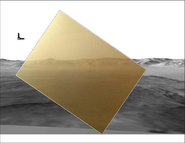 Here, NASA provides some perspective for that first, cockeyed landscape photo. The black-and-white scenes on either side of the tipped-up center rectangle are computer simulations built from data provided by two orbiting satellites, NASA's Mars Reconnaiss 