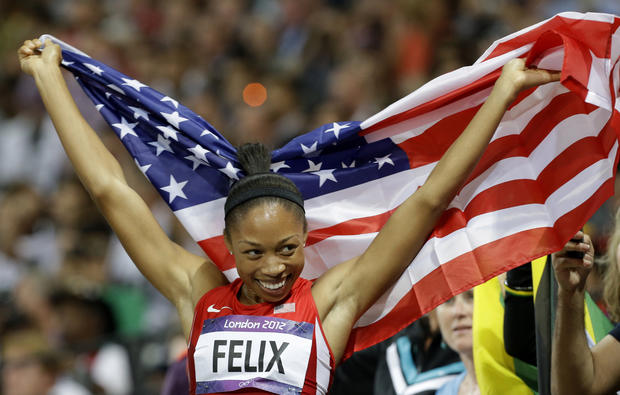 Allyson Felix celebrates her win in the women's 200-meter final  