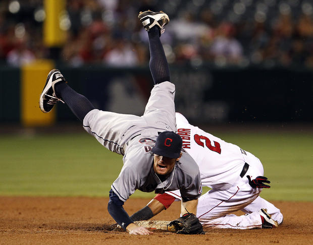  Jason Donald is upended but completes the double play 