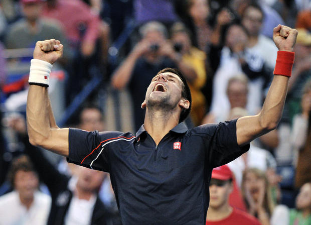 Novak Djokovic celebrates after defeating Richard Gasquet 