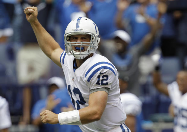 Andrew Luck celebrates after throwing a touchdown pass 