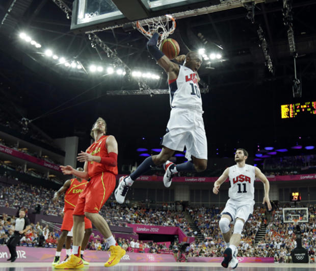 United States' Kobe Bryant reacts after a dunk 
