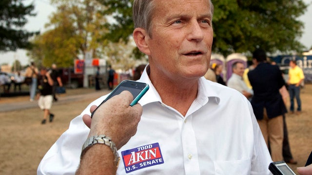 Rep. Todd Akin, R-Mo., talks with reporters while attending the Governor's Ham Breakfast at the Missouri State Fair in Sedalia, Mo., Aug. 16, 2012. 