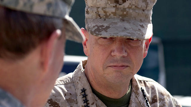 Marine Gen. John Allen, International Security Assistance Force commander, meets with Army Gen. Martin E. Dempsey, chairman of the Joint Chiefs of Staff, unseen, in Kabul, Afghanistan, Aug. 20, 2012, in this image released by the U.S. Department of Defens 