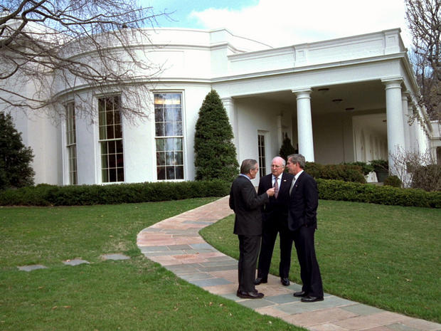 President George W. Bush meets with Vice President Dick Cheney and Defense Secretary Donald Rumsfeld outside the Oval Office shortly after Mr. Bush authorized Operation Iraqi Freedom March 19, 2003, at the White House in Washington. 
