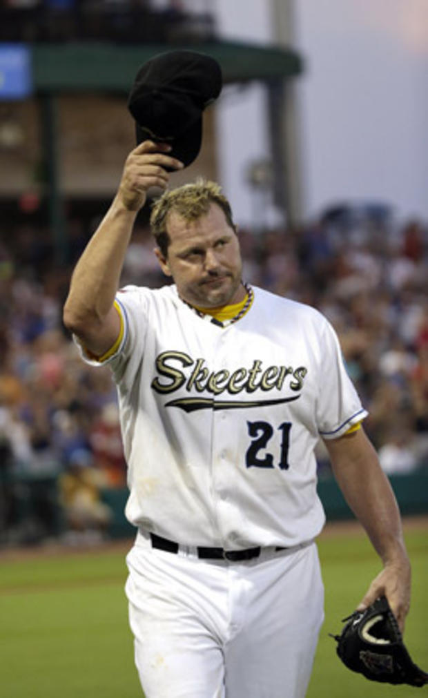 Sugar Land Skeeters pitcher Roger Clemens acknowledges the crowd as he leaves during the fourth inning  