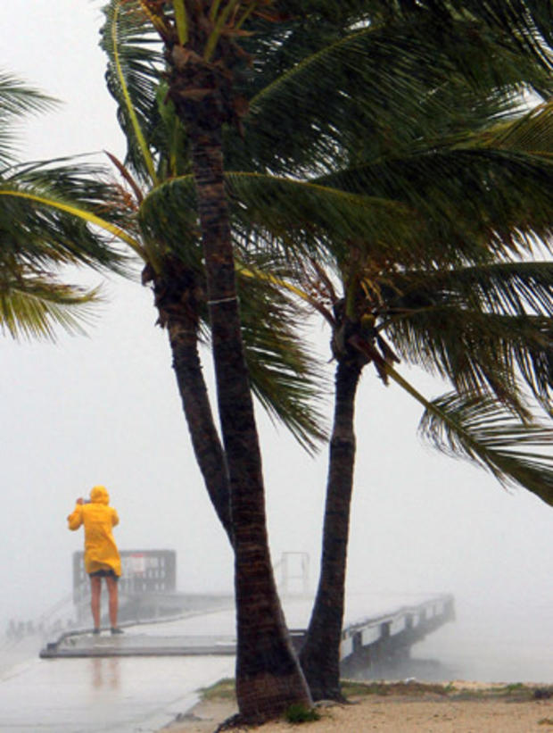 A person braves the rain  in Key West 